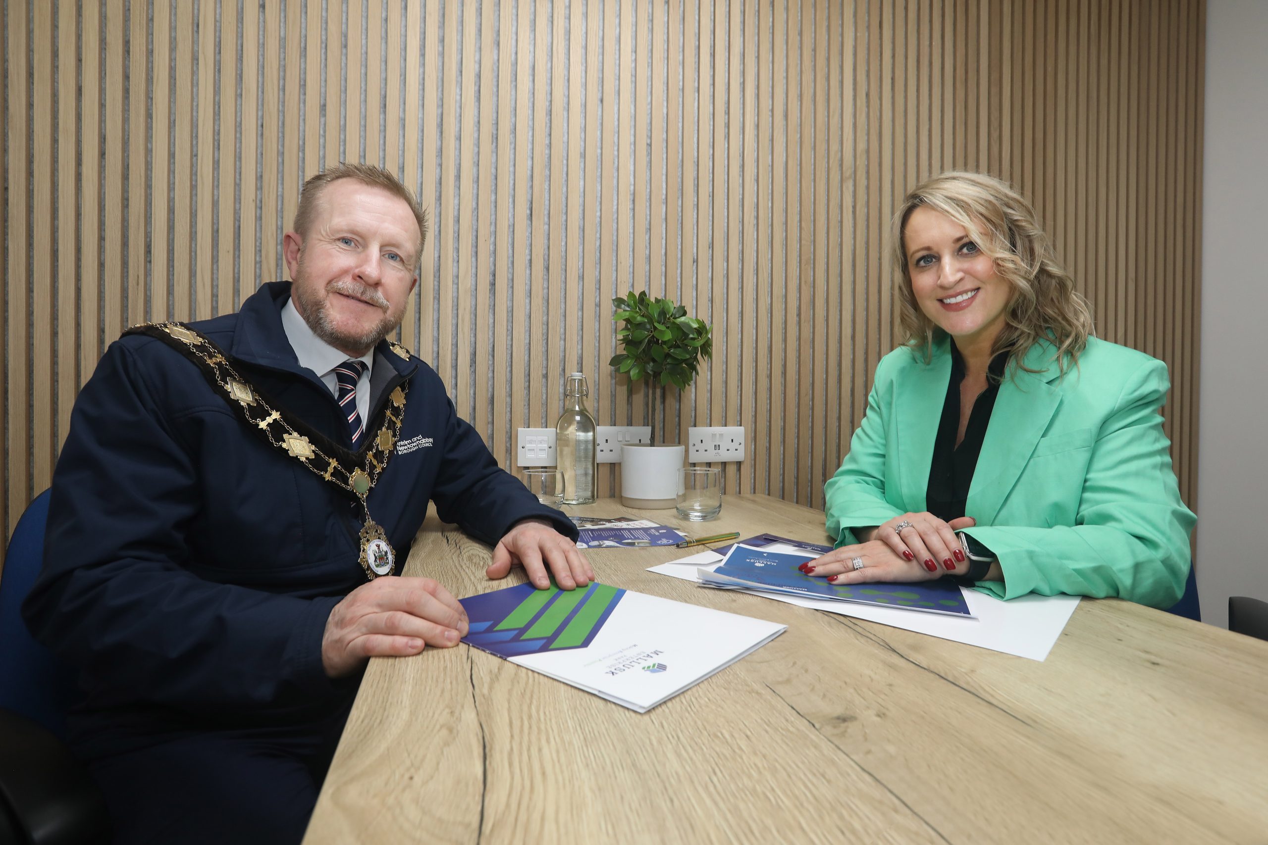 Antrim and Newtownabbey Mayor visits Mallusk Enterprise Park new Enterprise Hub space to test drive the new workspaces. Alderman Stephen Ross Photographed with CEO Emma Garrett in one of the huddle rooms small private meeting rooms in the new facility north of Belfast near Newtownabbey