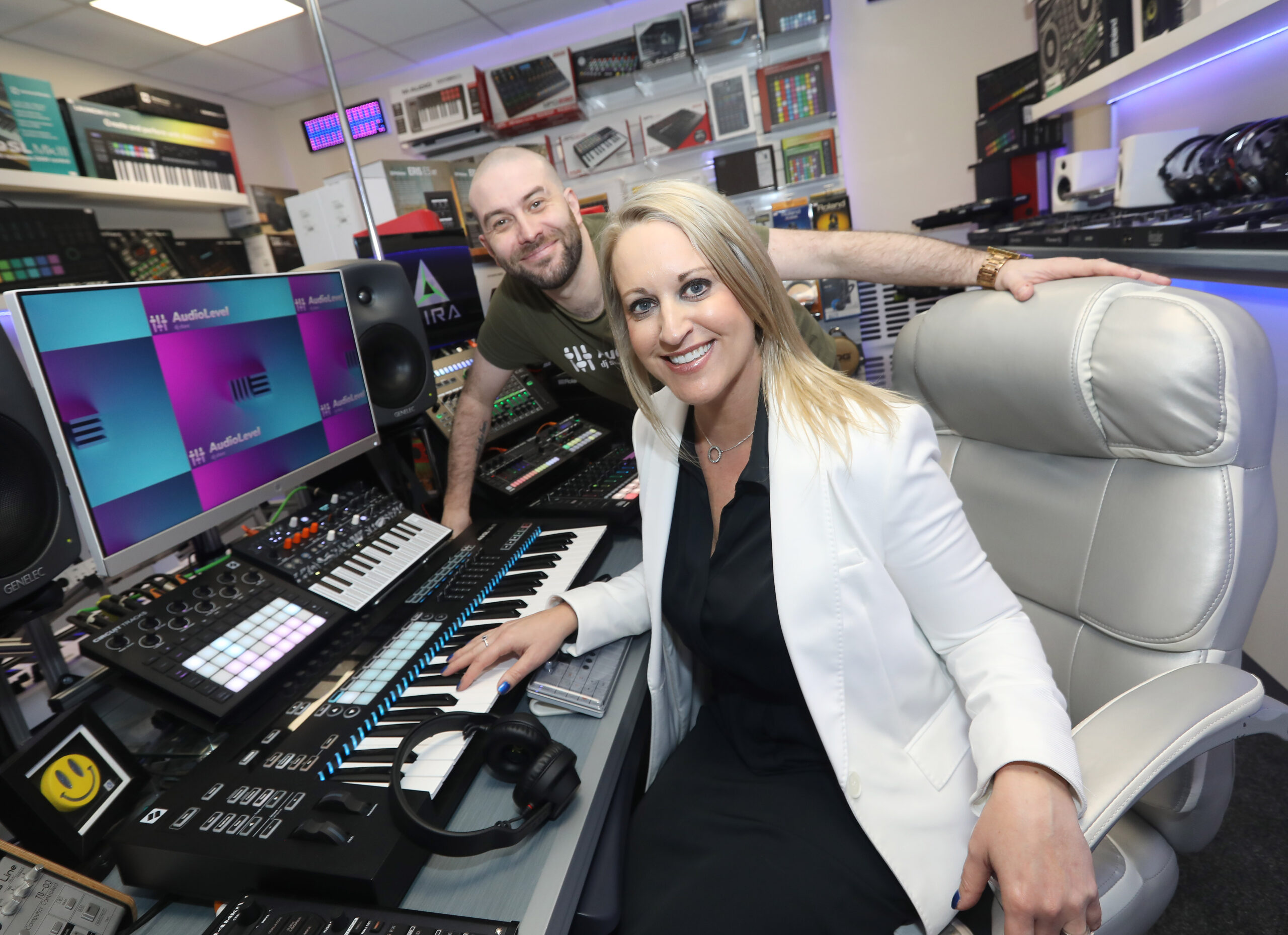 Doubling up at business park gives DJ floor space to provide an innovative retail experience to consumers (Left: Emma Garrett, Mallusk Enterprise Park CEO. Right: DJ and Founder of AudioLevel Craig Dalzell)